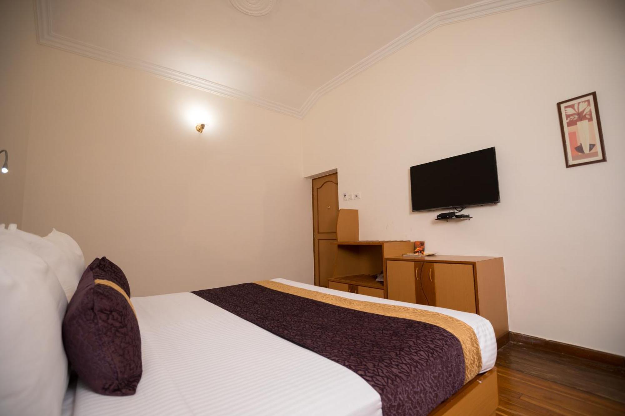 Hotel Kodai International Kodaikanal Pokoj fotografie
