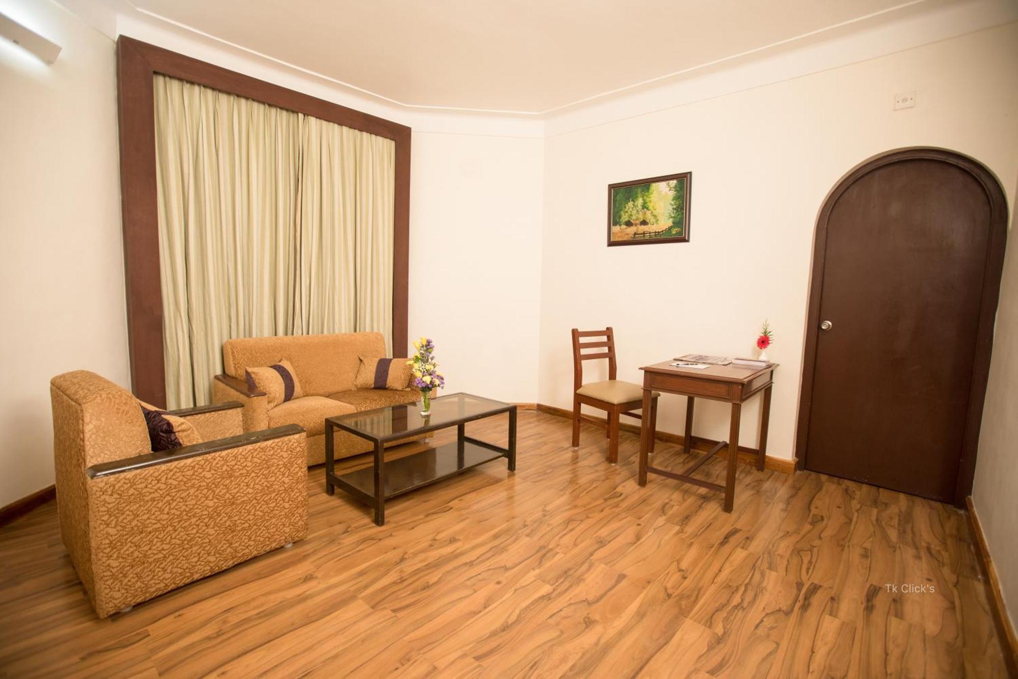Hotel Kodai International Kodaikanal Pokoj fotografie